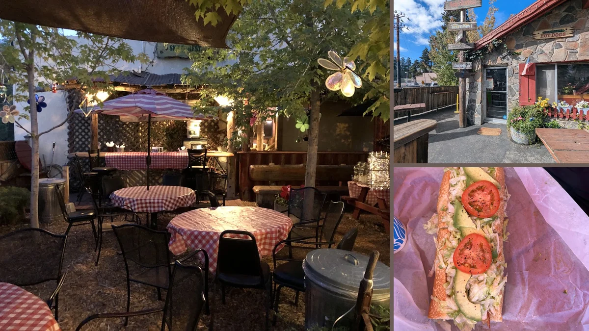 Outdoor tables beside a mountain-view setting.
