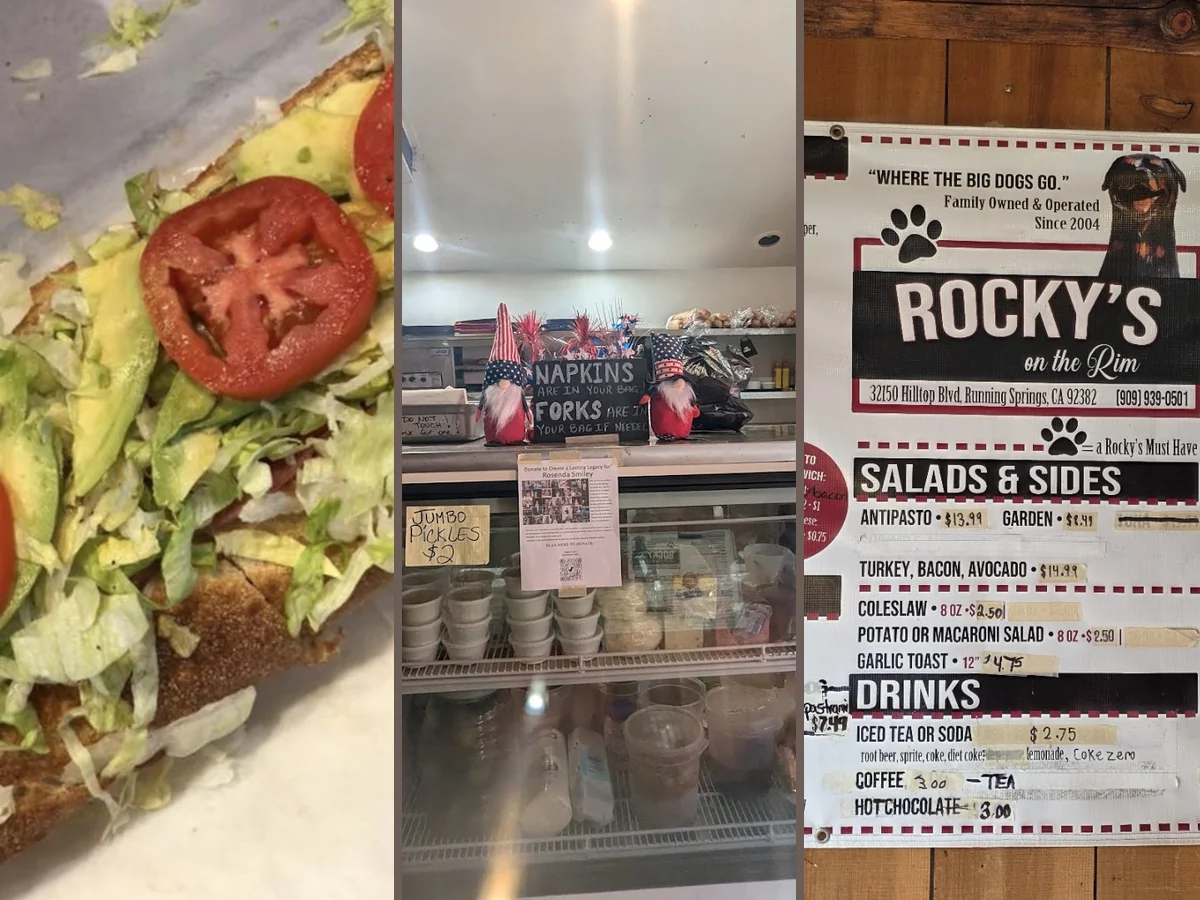 Sandwiches on a counter with sides nearby.